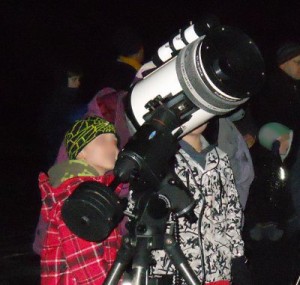 Picture of child at telescope